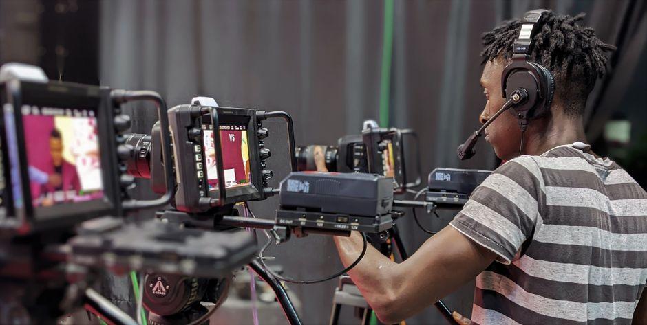 Man Behind a Video Camera